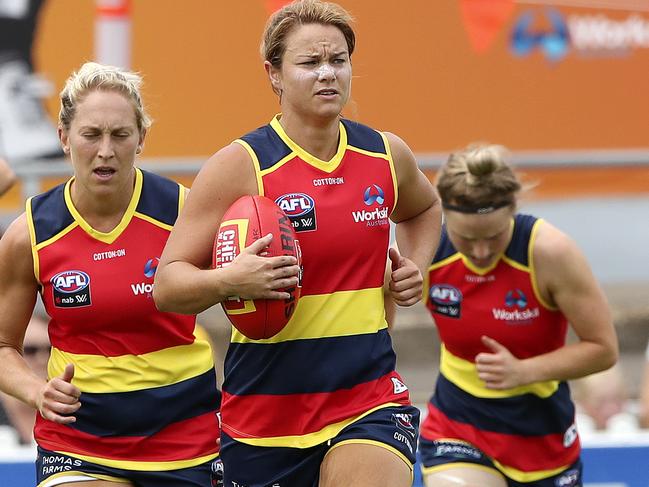 Courtney Cramey, centre, warms up before a game during the 2019 season. Picture: SARAH REED