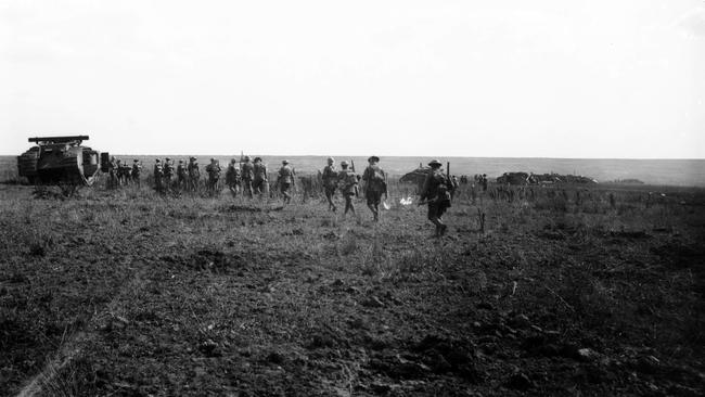 Troops of the 3rd Division, move forward near Ronssoy, to relieve American troops operating in the Le Catelet sector. Picture: Courtesy Australian War Memorial