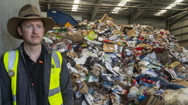 Waste education officer Scott Paterson in front of the recycled resource at the facility. Picture: Brian Cassey