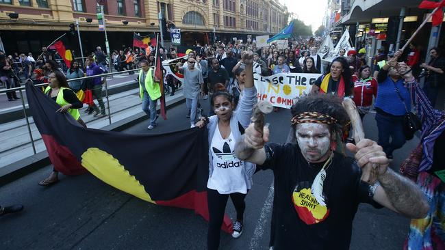 Protestors outside Flinders Street Station.