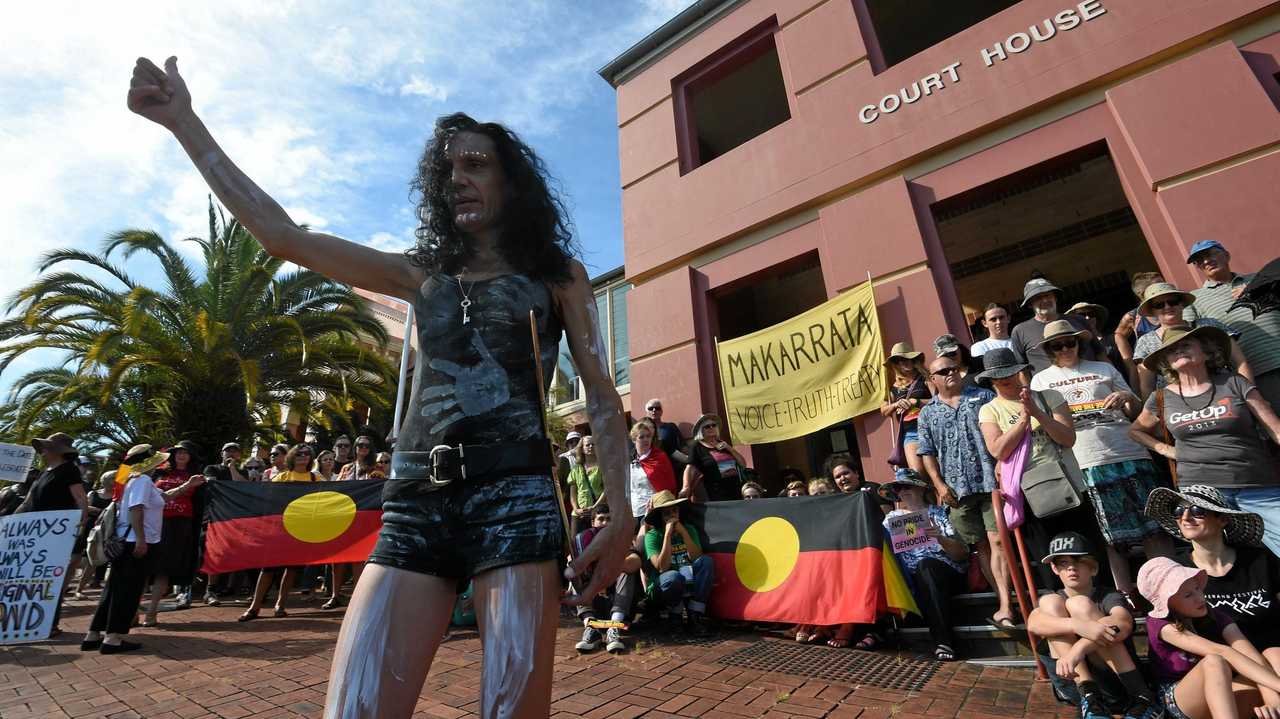 Protestors march through the streets of Lismore as part of the Invasion Day Protest that started at The Lismore Court House. Picture: Marc Stapelberg