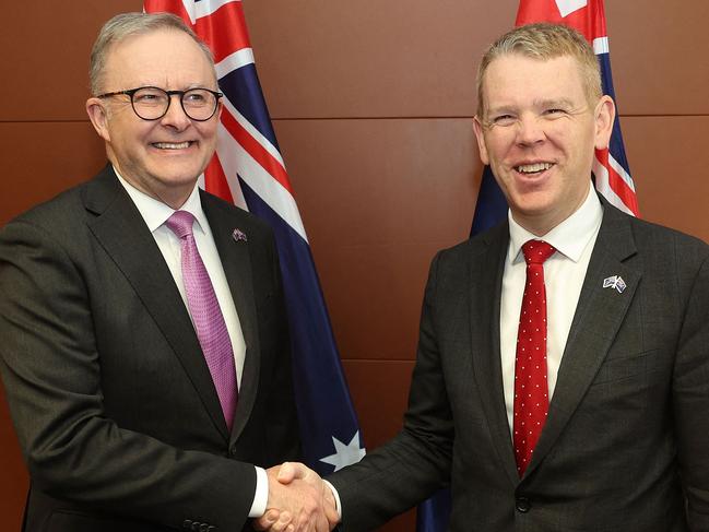 Prime Minister of New Zealand Chris Hipkins (R) with Australian Prime Minister Albanese shake hands prior to their Australia & New Zealand Leaders Meeting Bilateral at Parliament in Wellington on July 26, 2023. (Photo by Marty MELVILLE / AFP)