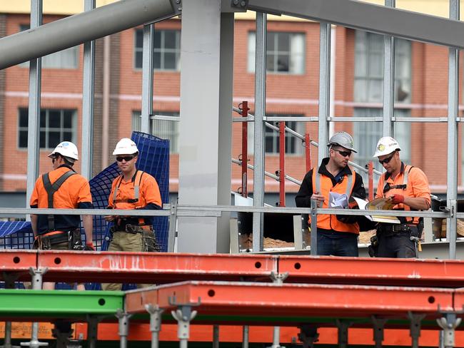 Get your hard hat on: the construction industry is buoyant in Sydney. Photo: AAP