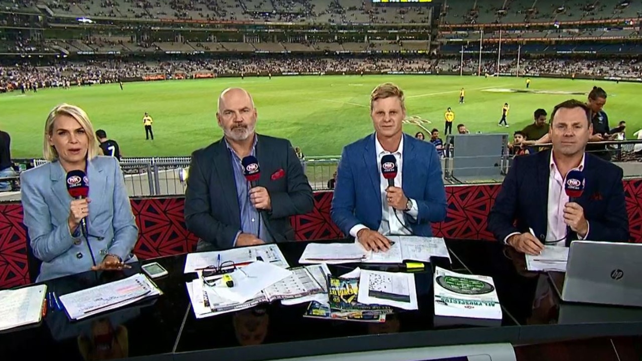 The Fox Footy panel had beer poured on them.