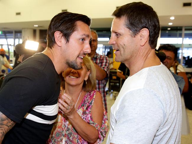 Mitchell Pearce and his dad Wayne at Sydney Airport. Picture Gregg Porteous