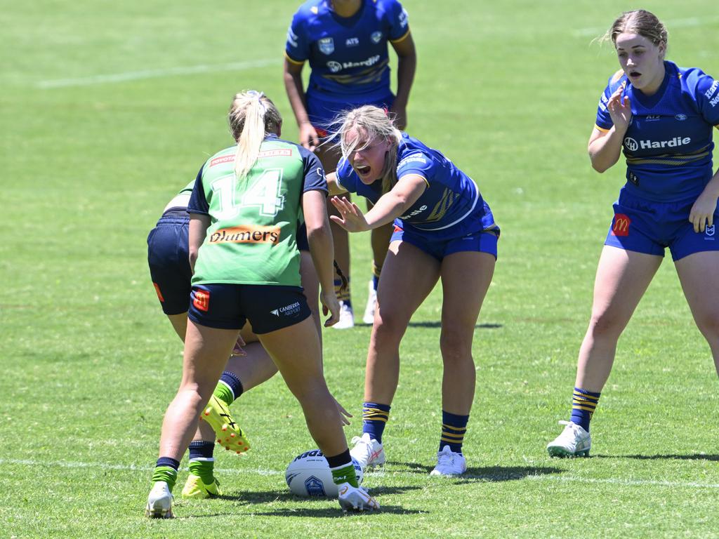 (From left) Rory Muller and Alana O'Loughlin at marker. Picture: Martin Ollman