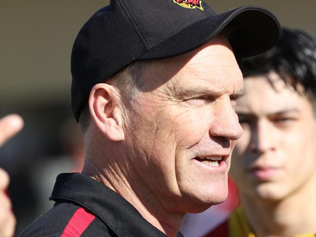 Justin Pickering speaks to his players. Picture: Andrew Keech.