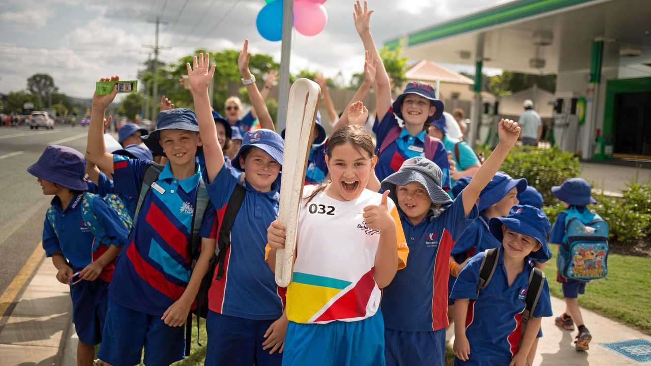 CELEBRATION TIME: Batonbearer Sage Volschenk with friends from her school during the Queens Baton Relay in Kilcoy yesterday. Picture: GOLDOC