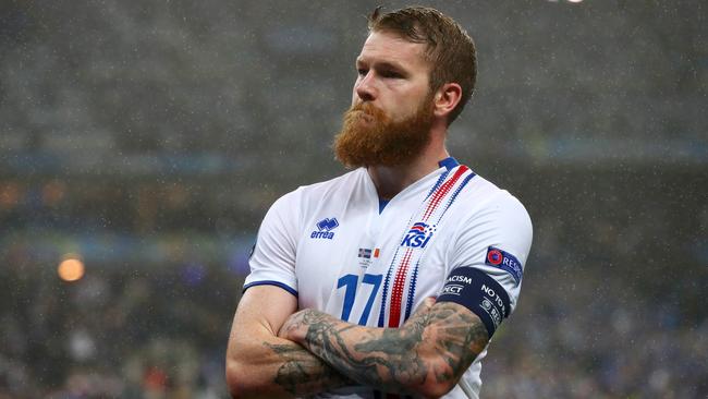 A dejected Aron Gunnarsson of Iceland.