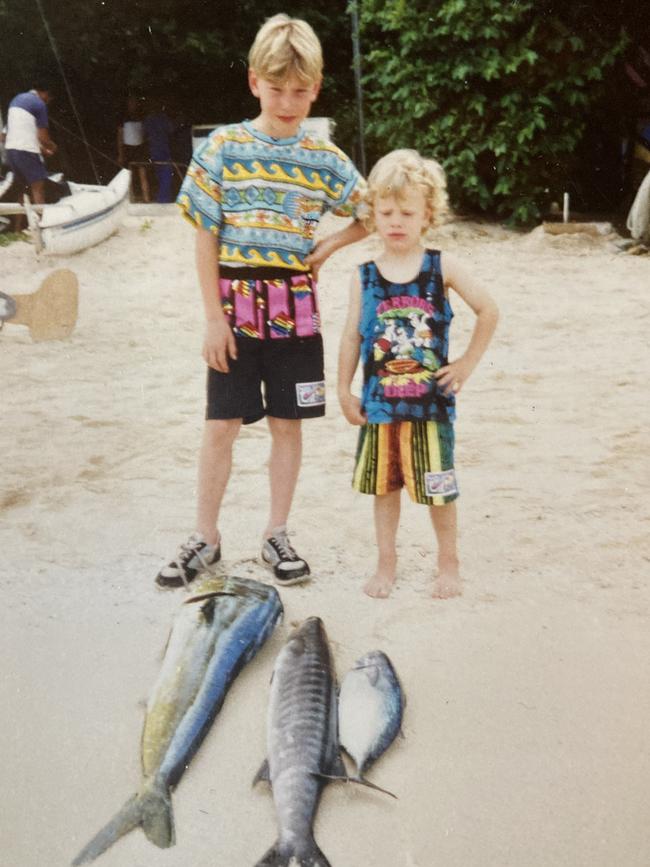 Shane and Travis Tuck after a family fishing trip.