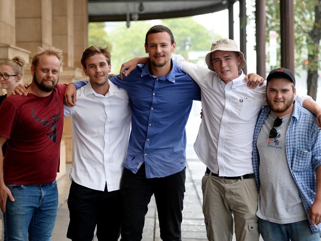 Salt Creek roadhouse owner Adam Stewart, with fishermen Andre Soule, Max Harrison, Jack Dowson and Nick Campbell outside the Supreme court after they had given evidence. Picture: Greg Higgs