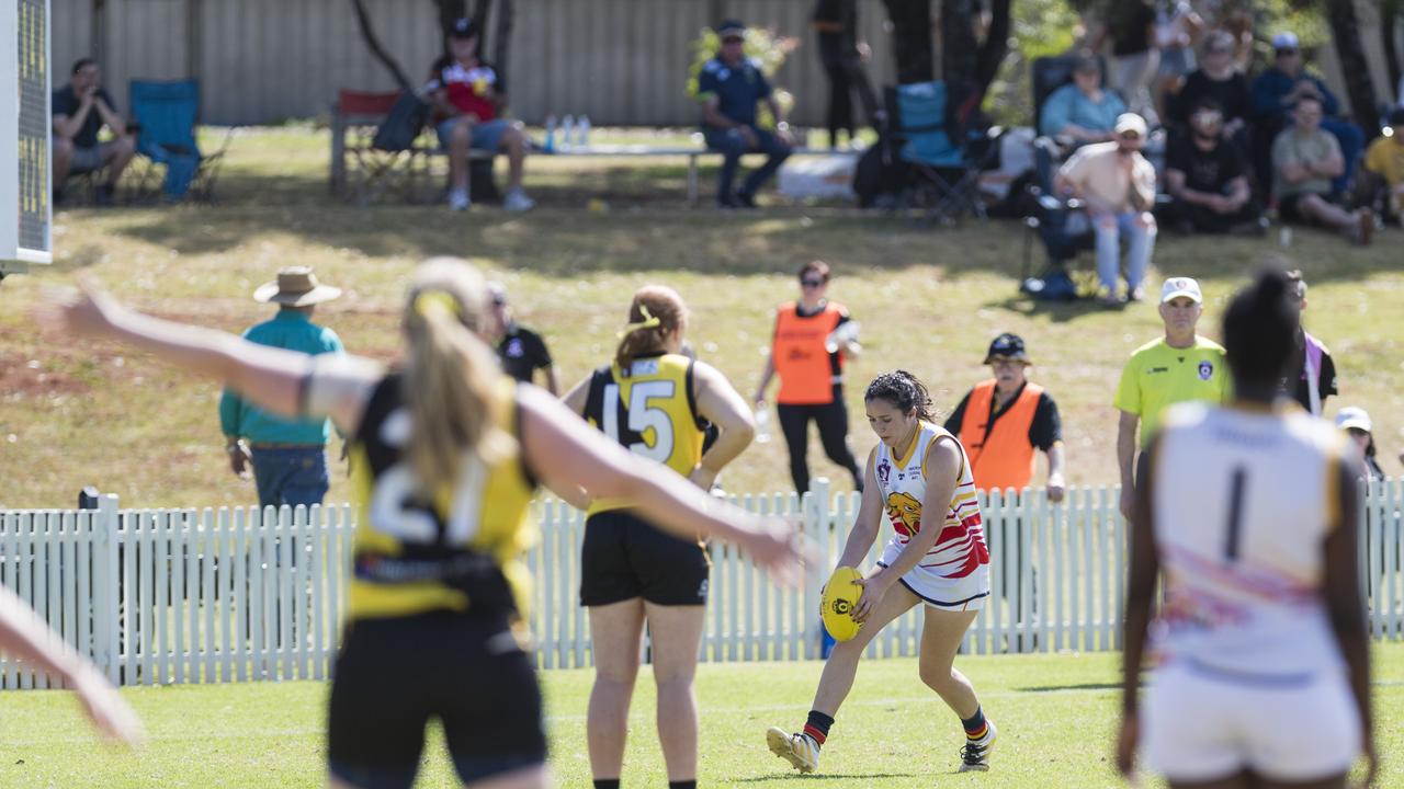 Rahnee Roberts kicks for University Cougars against Toowoomba Tigers in AFL Darling Downs Toowoomba Toyota Cup senior women grand final at Rockville Park, Saturday, September 2, 2023. Picture: Kevin Farmer