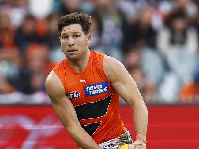 MELBOURNE, AUSTRALIA - JUNE 26: Toby Greene of the Giants runs with the ball during the round 15 AFL match between the Collingwood Magpies and the Greater Western Sydney Giants at Melbourne Cricket Ground on June 26, 2022 in Melbourne, Australia. (Photo by Daniel Pockett/Getty Images)