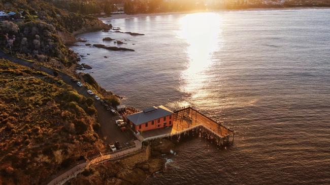 The unique Tathra Wharf overlooks nearby popular Tathra Beach. Photo: Andrew Buesnel