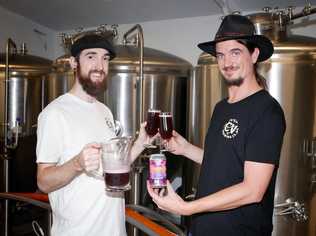 Currumbin Valley Brewing's Luke Ronalds and Peter Wheldon toast the success of their Grape Bubblegum Sour brew which was named the People's Choice at the Great Australasian Beer Spectacular.