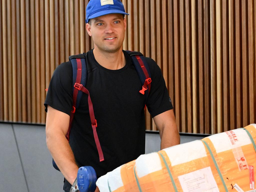 MELBOURNE, AUSTRALIA - NOVEMBER 22: Alex Carey arrives back in Australia after winning the Cricket World Cup Final in India last Sunday, on November 22, 2023 in Melbourne, Australia. (Photo by Morgan Hancock/Getty Images)