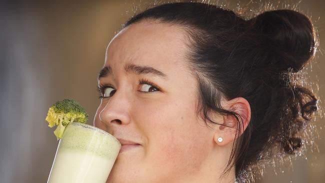 Millicent Preston tries the Broccolilatte. Picture: David Caird