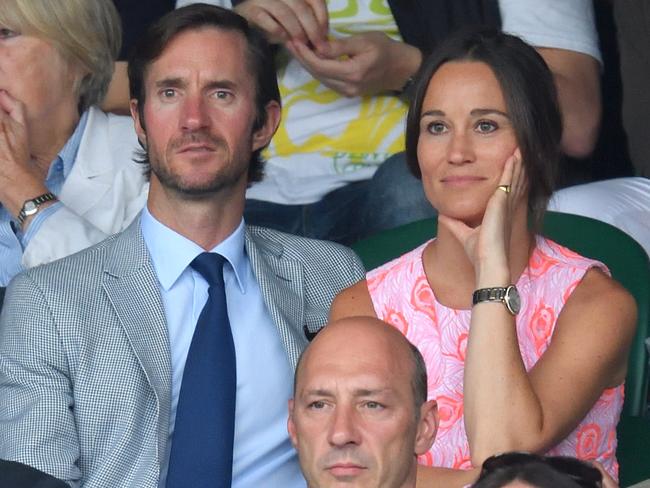 Pippa Middleton and James Matthews watch the action at the Wimbledon Tennis Championships in London in July last year. Picture: Karwai Tang/WireImage.