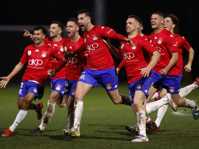 MELBOURNE, AUSTRALIA - AUGUST 06: Melbourne Srbika players celebrate winning on penalties during the 2024 Australia Cup Round of 32 match between FC Melbourne Srbika and Modbury Jets SC at Home of the Matildas on August 06, 2024 in Melbourne, Australia. (Photo by Darrian Traynor/Getty Images)