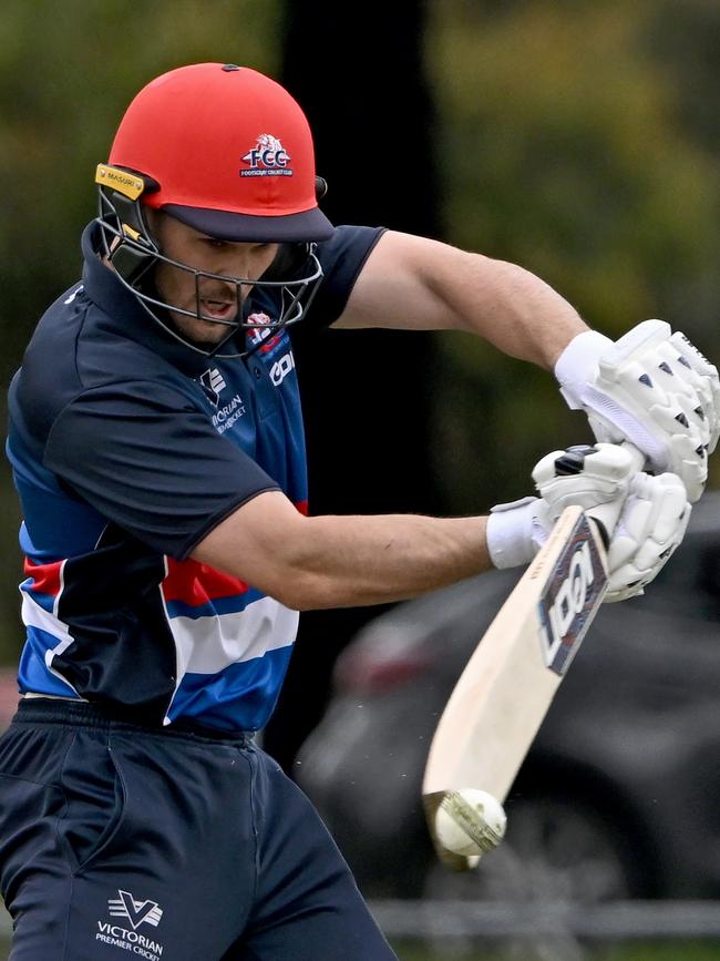 Footscray’s Dylan Kight lays some bat on this one. Picture: Andy Brownbill