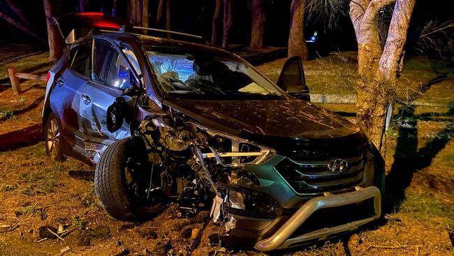 A car involved in a crash on Wakehurst Parkway, North Narrabeen, on a Friday night last month. Four people were taken to hospital and the road closed for about two hours after the two-car collision. Picture: NSW Fire and Rescue (Narrabeen)