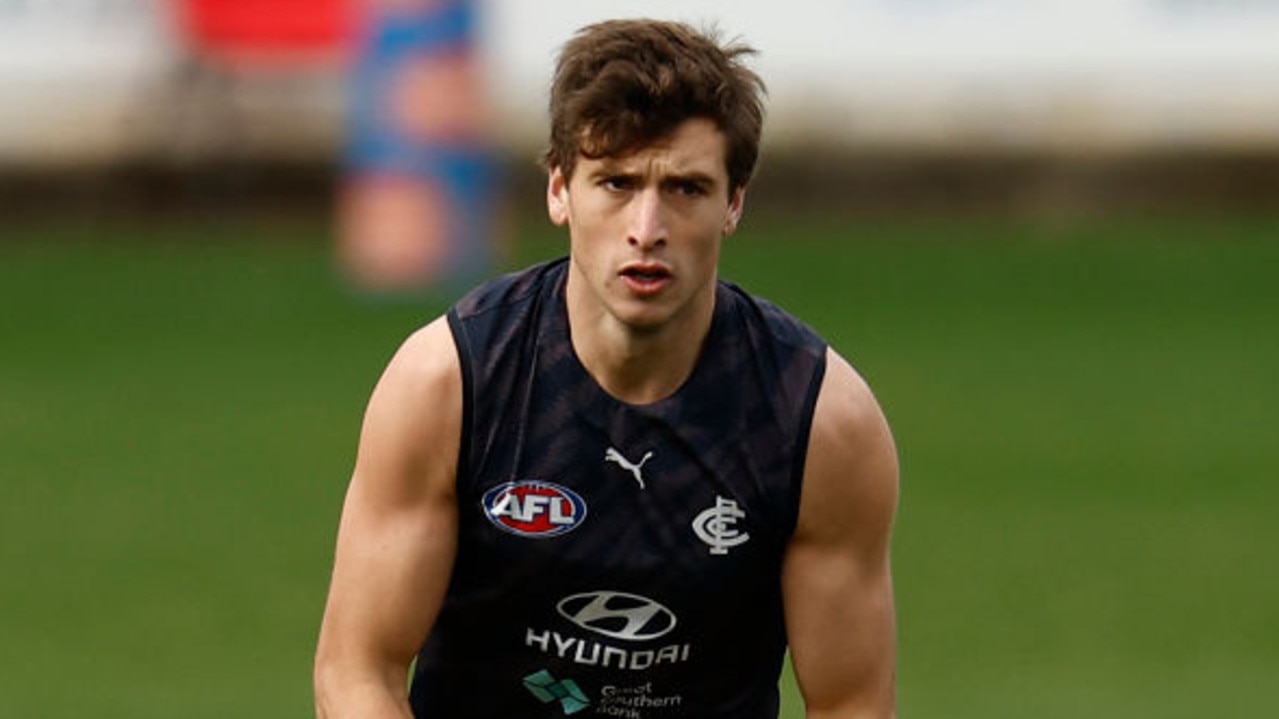 MELBOURNE, AUSTRALIA - JUNE 09: Caleb Marchbank of the Blues runs with the ball during a Carlton Blues AFL training session at Ikon Park on June 09, 2022 in Melbourne, Australia. (Photo by Darrian Traynor/Getty Images)