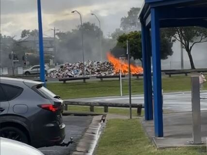 A Gold Coast rubbish truck was forced to dump its load in ashmore after it caught fire. Picture: contributed.