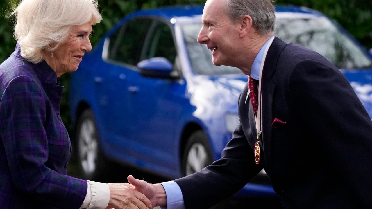 The Duchess of Cornwall shakes hands with Lord Lieutenant of Buckinghamshire Alexander Boswell (R) during her visit of the Thames Valley Partnership charity. Picture: Matt Dunham / AFP