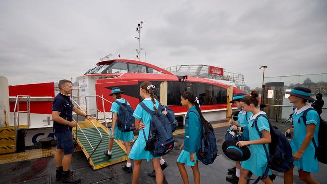 Students boarding the new ferry service which will depart Circular Quay in the morning.