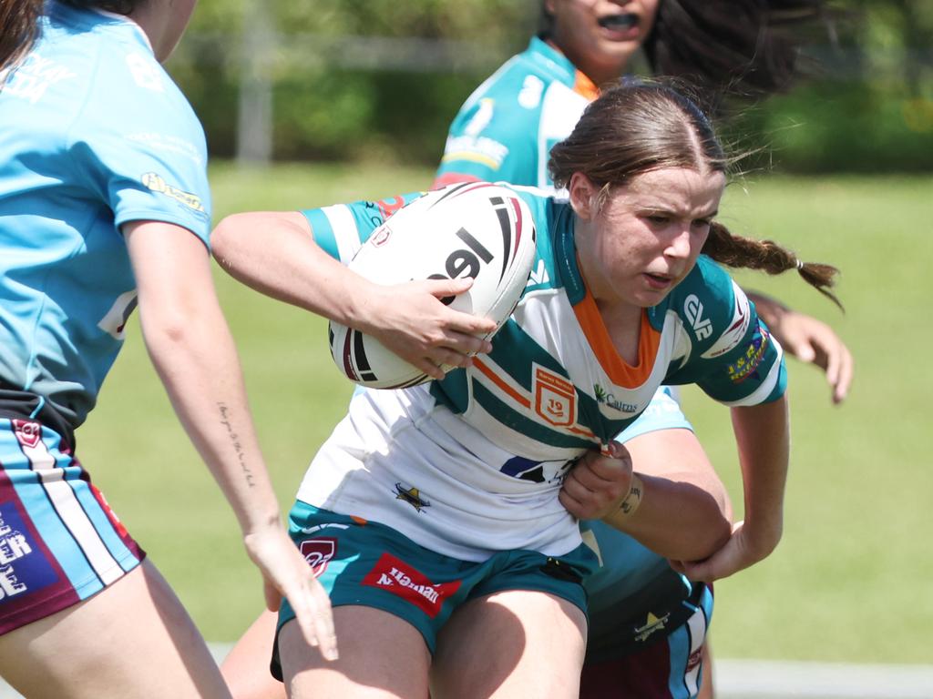 Sari Ericson proves hard to stop in the Queensland Rugby League (QRL) Under 19 Women's match between the Northern Pride and the Mackay Cutters, held at Barlow Park. Picture: Brendan Radke