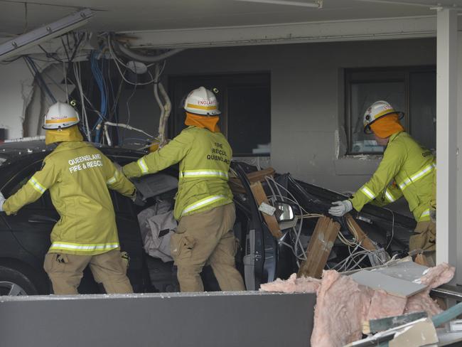 Emergency services at the Allan Cunningham Motel on Ruthven St where a car smashed into the building in Kearneys Spring, Thursday, October 11, 2018.