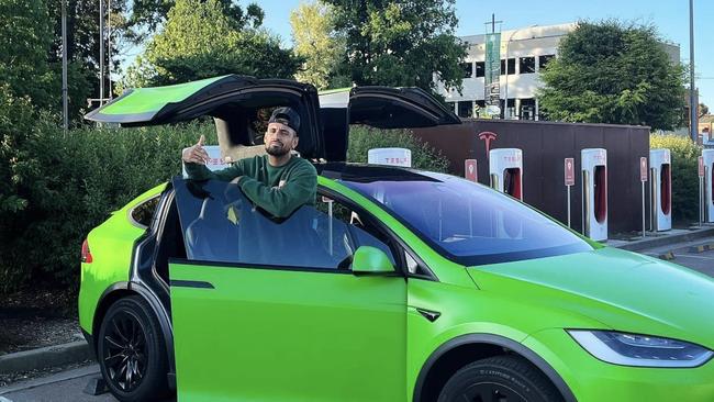 The tennis star is well known for his bright green Tesla.