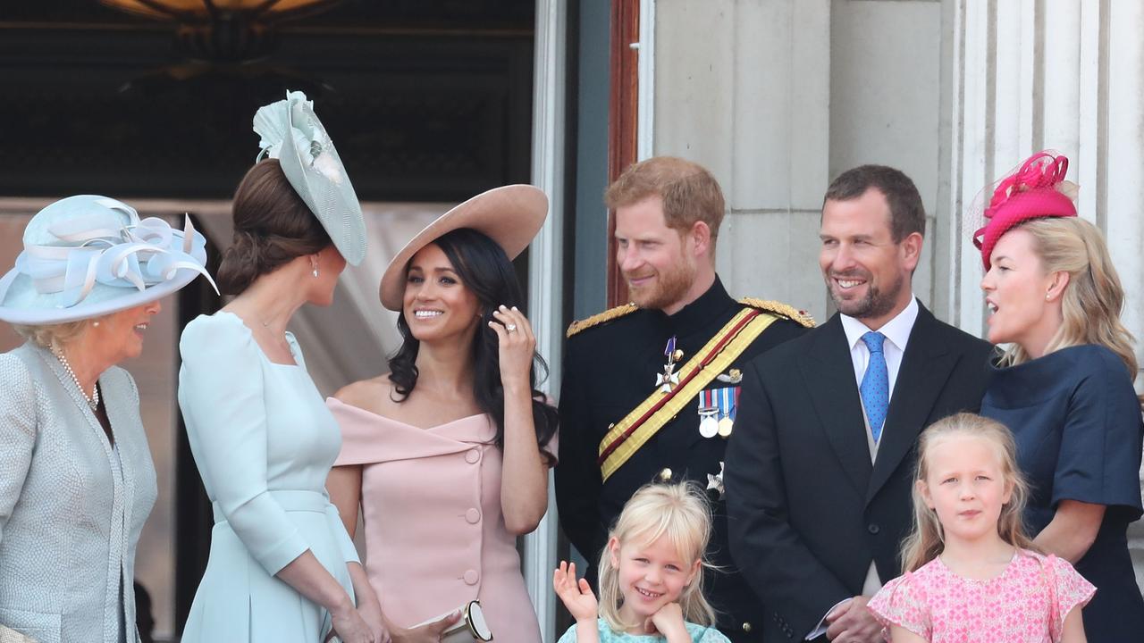 Kate, Meghan, Harry and other members of the royal family on the Palace balcony during the annual Trooping the Colour parade. Picture: Chris Jackson/Getty Images