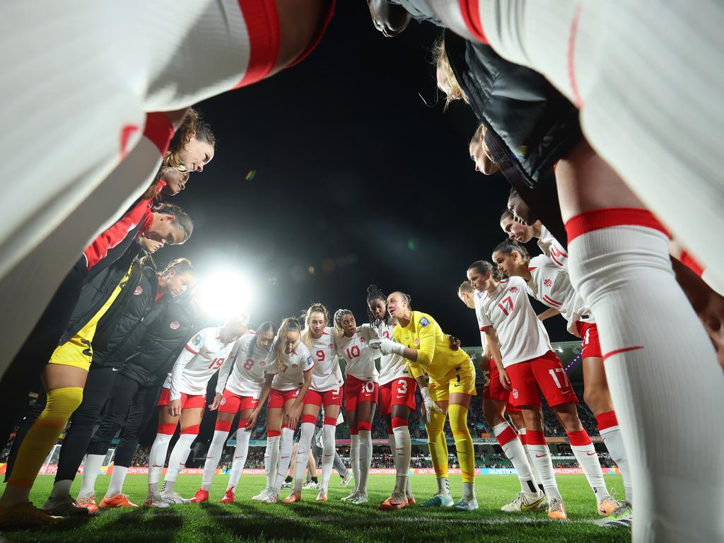 The Canadian players huddle prior to their game against Ireland in Perth. Picture: Alex Grimm/Getty Images