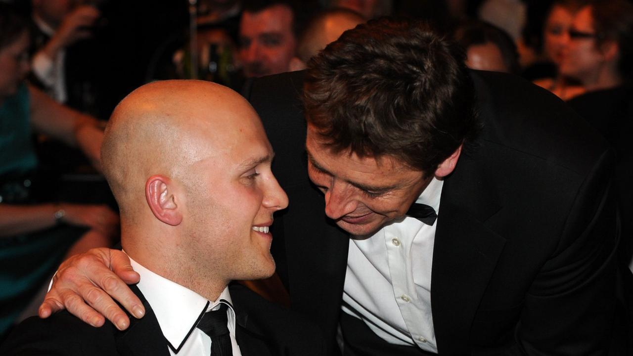 Gary Ablett Jr is congratulated by Mark Thompson after winning the Brownlow Medal.