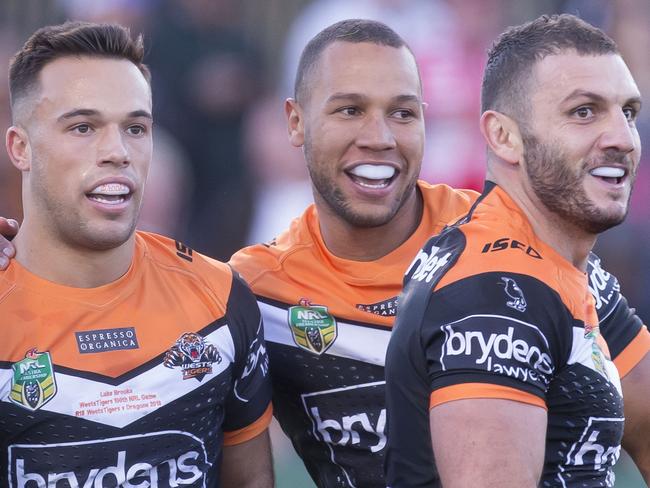 Wests Tigers celebrate try by Luke Brooks during the Round 18 NRL match between the St George-Illawarra Dragons and the Wests Tigers at UOW Jubilee Oval in Sydney, Sunday, July 15, 2018. (AAP Image/Craig Golding) NO ARCHIVING, EDITORIAL USE ONLY