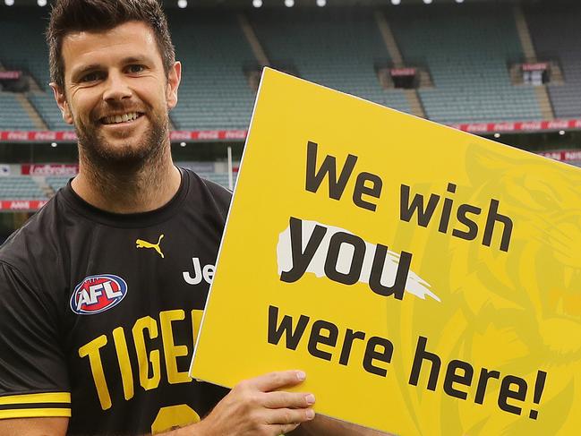 AFL Round 1. Richmond vs Carlton at the MCG..  20/03/2020.  Trent Cotchin of the Tigers holds a sign for the fans pre game   . Pic: Michael Klein