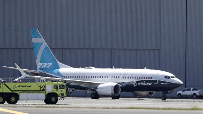 A Boeing 737 MAX jet taxis after landing at Boeing Field following a test flight. Picture: AP Photo/Elaine Thompson.