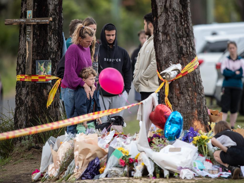 Mourners pay their respects to the five teenagers who died in the crash. Picture: Julian Andrews