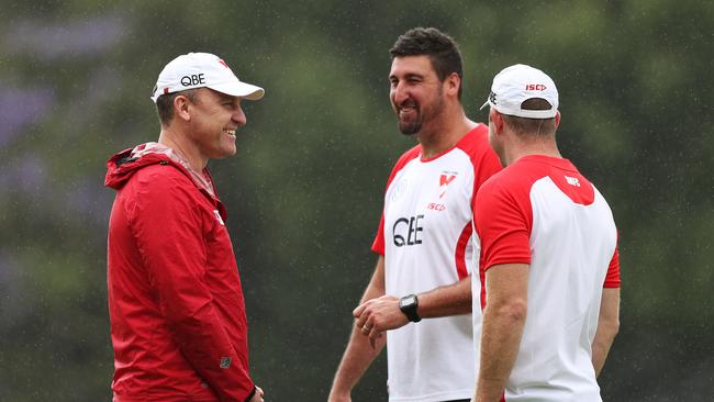 John Longmire and his successor Dean Cox. Picture: Brett Costello