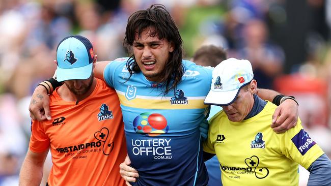 SYDNEY, AUSTRALIA - MARCH 23: Tino Fa'asuamaleaui of the Titans is helped from the field during the round three NRL match between Canterbury Bulldogs and Gold Coast Titans at Belmore Sports Ground, on March 23, 2024, in Sydney, Australia. (Photo by Brendon Thorne/Getty Images)