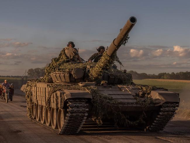 Ukrainian servicemen operate a Soviet-made T-72 tank in the Sumy region, near the border with Russia, on August 12, 2024, amid the Russian invasion of Ukraine. Ukraine launched a surprise offensive into the Russian border region of Kursk on August 6, 2024, capturing over two dozen towns and villages in the most significant cross-border attack on Russian soil since World War II. Ukraine's military chief Oleksandr Syrsky told President Volodymyr Zelensky in a video posted on August 12, 2024 that his troops now control about 1,000 square kilometres of Russian territory and are continuing 