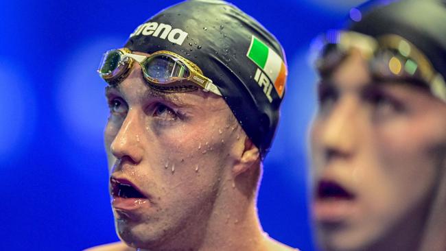 Winner Ireland's Daniel Wiffen (L) and eighth-placed Ireland's Nathan Wiffen (R) look on after the men's 1500m freestyle final event of the European Short Course Swimming Championships in Otopeni December 7, 2023. Picture: AFP