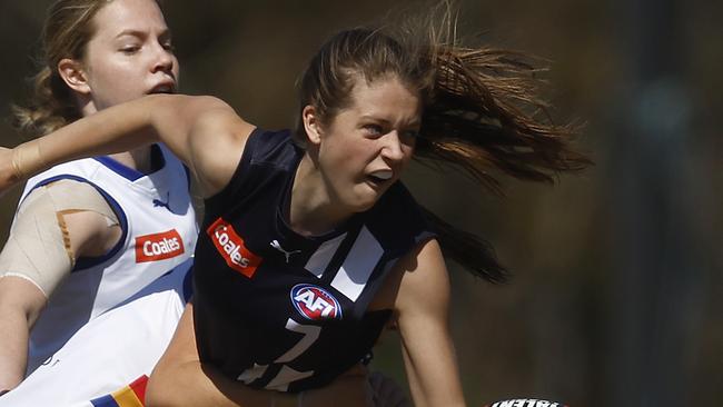 MELBOURNE, AUSTRALIA - SEPTEMBER 16: Sara Howley of the Falcons handballs whilst being tackled by Evie Parker of the Ranges during the Coates Talent League Girls Preliminary Final match between Eastern Ranges and Geelong Falcons at Shepley Oval on September 16, 2023 in Melbourne, Australia. (Photo by Daniel Pockett/AFL Photos/via Getty Images)