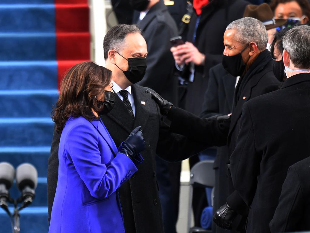 Kamala Harris and Doug Emhoff greet former US President Barack Obama. Picture: AFP