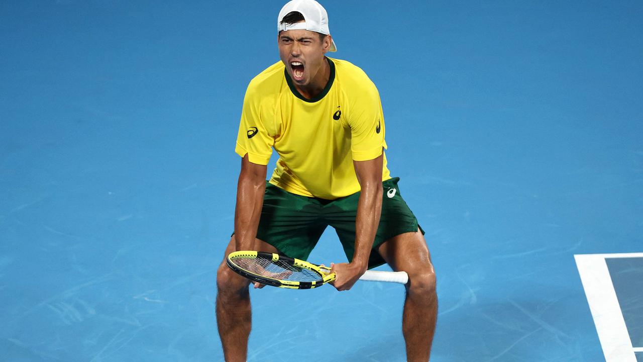 Australia's Jason Kubler celebrates victory against Britain's Daniel Evans. (Photo by DAVID GRAY / AFP)