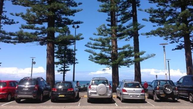 Northern Beaches and Mosman councils are pushing back against a state government proposal to give beach parking permits to renters so they can park at locations like Manly Beach (pictured) for free. Picture: Manly Daily