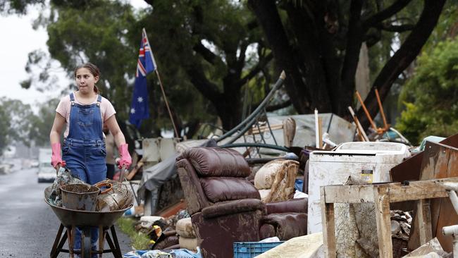 Yumi says her grandmother is “really sad” about her destroyed house. Picture: Jonathan Ng