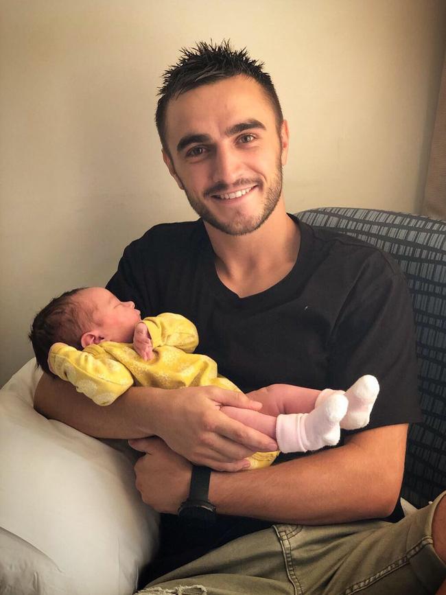 Boxing champion Jason Moloney with daughter Isla born at Tweed Heads Hospital on March 6 - Photo supplied