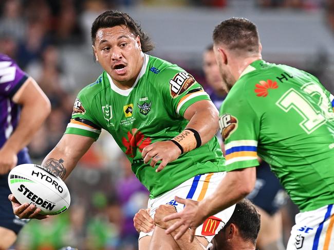 Josh Papalii of the Raiders passes in the NRL Preliminary Final against the Melbourne Storm.